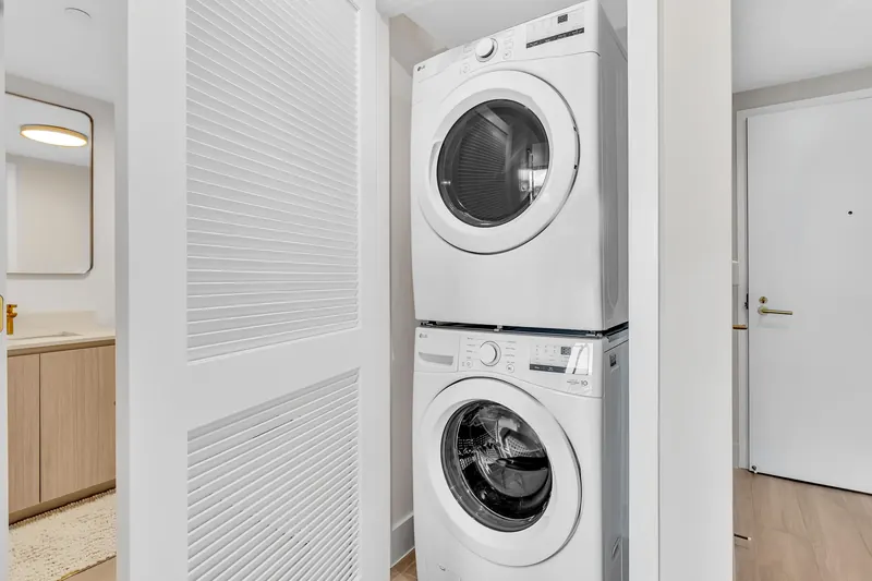 Stacked washer and dryer by the entry